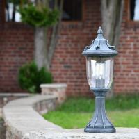 Ornate Verdigris Pillar Light in Situ on a Brick Wall