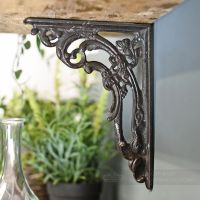 Ornate Cast Iron Shelf Bracket in Situ Ornate Cast Iron Shelf Bracket in Situ