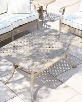 Close up of the main centre table showing the lattice pattern ad scrollwork detailing