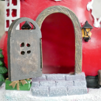 Close-up of the Front Door on the Painted Christmas Boot House Close-up of the Front Door on the Painted Christmas Boot House