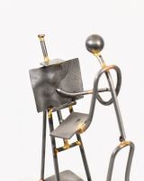 Close up of artist scrap metal sculpture