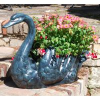 Pale Verdigris Swan Flower Planter in situ