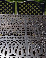 The "Sommelier" 8-Seater Outdoor Dining Set - Antique Copper Table Design Close Up The "Sommelier" 8-Seater Outdoor Dining Set - Antique Copper Table Design Close Up