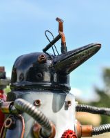Close up of Penguin Diver Recycled Metal Sculpture head