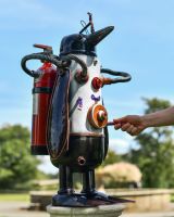 Scale image of Penguin Diver Recycled Metal Sculpture 