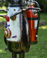 Close up of Penguin Diver Recycled Metal Sculpture wing
