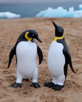 ‘Waddle’ the Penguin Cast Aluminium Garden Sculpture - Looking Down stood next to "Pebble" the penguin