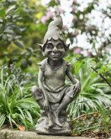 Perched pixie resin garden statue Perched pixie resin garden statue