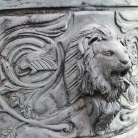 Impressive lion detail on bronze chariot sculpture