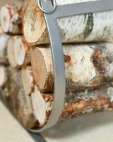 Close-Up of Pewter Log Store in Use Close-Up of Pewter Log Store in Use