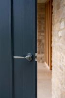 Pewter Round Lever Door Handle on Beehive Rose in Situ Pewter Round Lever Door Handle on Beehive Rose in Situ