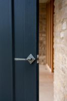 Pewter Round Lever Door Handle on Diamond Rose in Situ