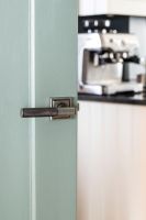 Pewter Textured Lever Door Handle on Square Rose on Door