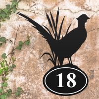 Pheasant Iron House Number Sign in Situ on a Rustic Wall 