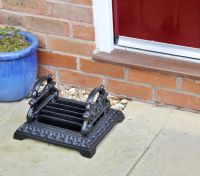 Pickwick art deco cast iron boot scraper outside