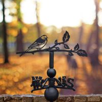 Pied wagtail weathervane in the forest Pied wagtail weathervane in the forest