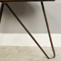 Close-up of the Iron Pin Legged on the Coffee Table