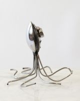 Side view of scrap metal art sculpture