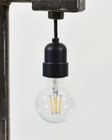 Close up of Industrial Style Pipe Lamp with Solid Wood Base bulb