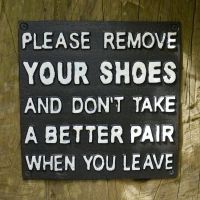"Please Remove Your Shoes And Don"t Take A Better Pair When You Leave" Cast Iron Sign in Black with White Text