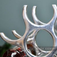 Curved Design on the Polished Aluminium Floor Standing Wine Rack