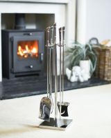 Polished "Argenti" Companion Set In A Fireside Setting