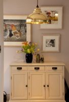 Polished Brass Curved Hanging Pendant Light with Smooth Brass Interior in Lounge