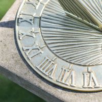 Close-Up of Roman Numerals with Cast Shadow Close-Up of Roman Numerals with Cast Shadow