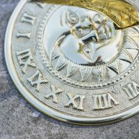 Close-Up of Roman Numerals onPolished Brass "Sun & Moon" Sundial - 195mm