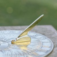 Close-Up of Polished Brass "Sunburst" Sundial - 200mm
