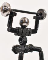 Close up of intricate figure detail on scrap metal art sculpture