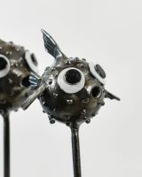 Close up of Pufferfish Family Sculpture fish face