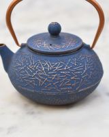 Close up of "Qianping" Cast Iron Blue and Copper Finish Japanese Style Teapot detailing