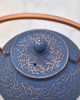 Close up of "Qianping" Cast Iron Blue and Copper Finish Japanese Style Teapot Lid