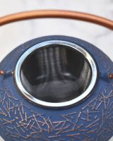 Close up of "Qianping" Cast Iron Blue and Copper Finish Japanese Style Teapot strainer
