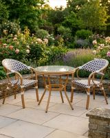 Rattan Black And White Table And Chairs digital illustration