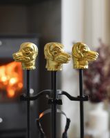 Close up of dog head detail on fireside companion set