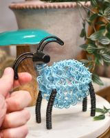 Scale image of recycled metal art sculpture Scale image of recycled metal art sculpture