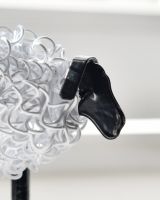 Close up of face detail on recycled metal art sculpture