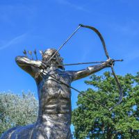 Recycled Cast Aluminium Brushed Gold "Archer" Centaur Sculpture in Situ Recycled Cast Aluminium Brushed Gold "Archer" Centaur Sculpture in Situ