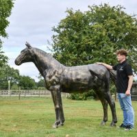 Scale Shot of Recycled Cast Aluminium Brushed Gold Secretariat Horse Sculpture Scale Shot of Recycled Cast Aluminium Brushed Gold Secretariat Horse Sculpture