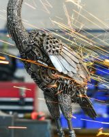 Close up of intricate body detail on scrap metal heron sculpture