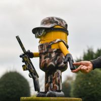 Scale Shot of Recycled Metal "Ghillie Suit Soldier" Minion Sculptur Scale Shot of Recycled Metal "Ghillie Suit Soldier" Minion Sculptur
