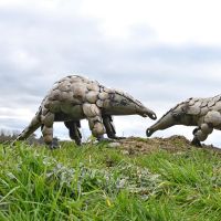 Recycled Metal Pangolin Sculpture in Situ in the Garden