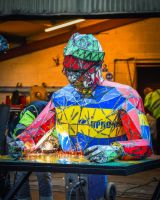 Recycled oil drum sculpture the author low light sparks