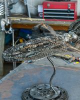 Close up of intricate details on recycled metal squid sculpture
