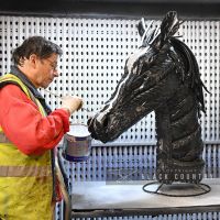 Recycled Car Tyre Horse Head Being Painted in Our Workshop Recycled Car Tyre Horse Head Being Painted in Our Workshop