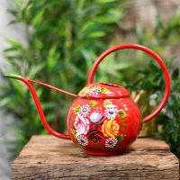 Red Narrowboat Watering Can with Floral Design Red Narrowboat Watering Can with Floral Design