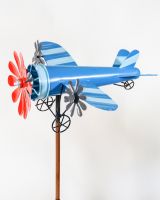 Vintage Airplane Wind Spinner Stakes - Blue and Red on a White Background