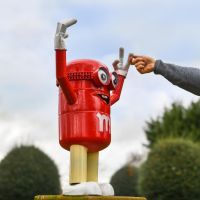 Scale Shot of Red Recycled Metal "Sweet Tooth" Henchman Sculpture Scale Shot of Red Recycled Metal "Sweet Tooth" Henchman Sculpture